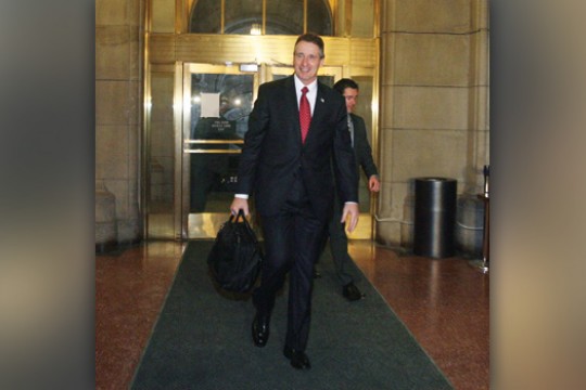 Person walking down hallway