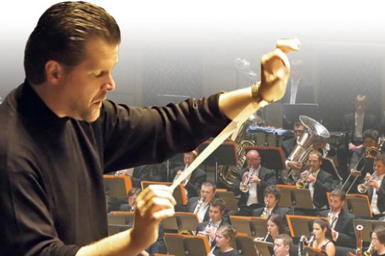 Person conducting orchestra