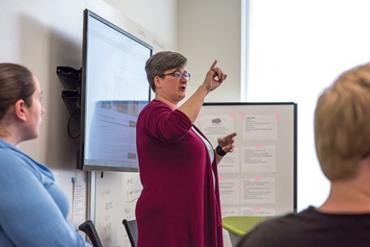 woman uses sign language 