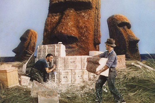 Two people working on Easter Island.