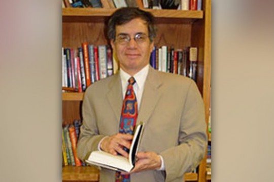 Professor reading book