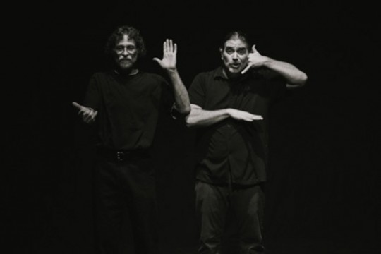 People signing on stage