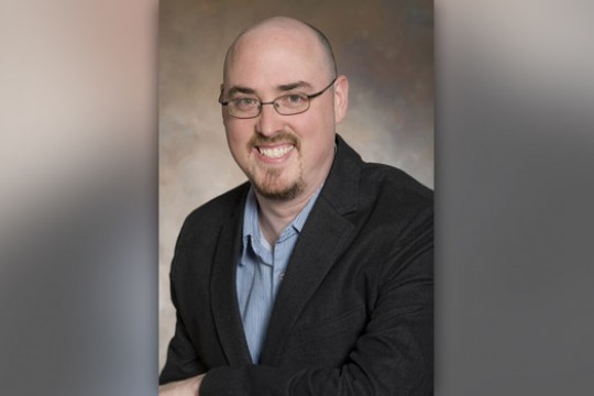 Professor posing for camera