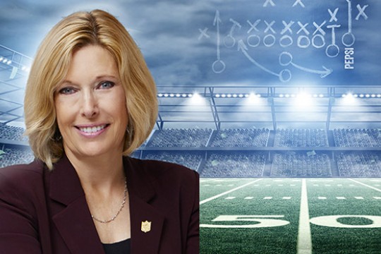 Dawn Hudson displayed over Football stadium