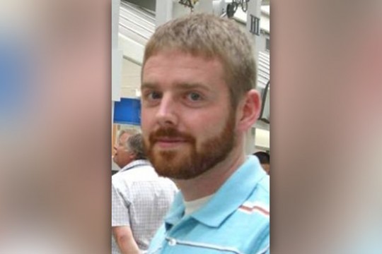 Professor posing for camera