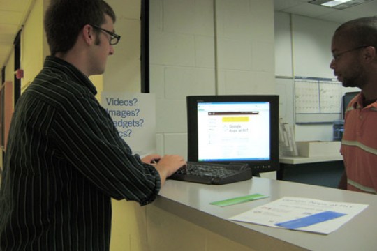 Person using computer at desk