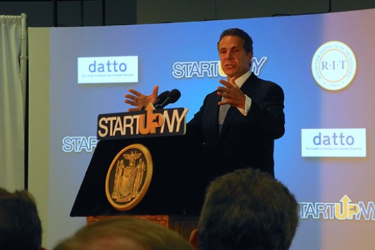 Governor giving speech at podium