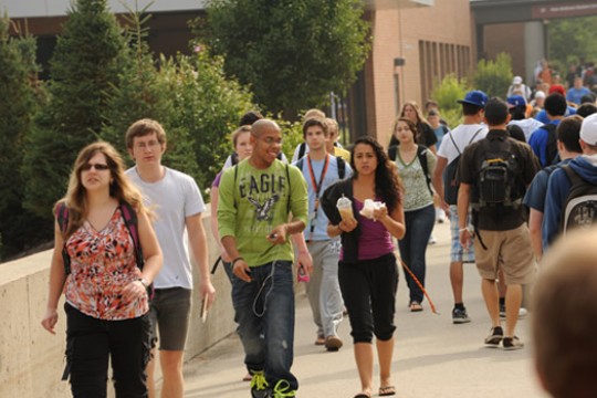 People walking down path