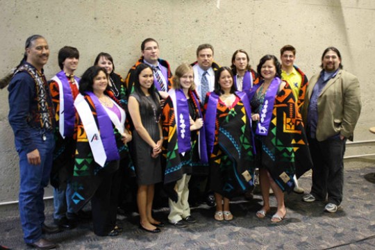 People gathered posing for camera