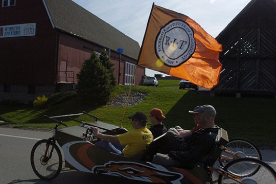 People driving homemade vehicle 