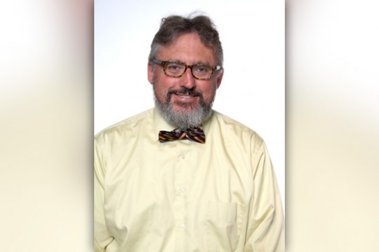 Professor posing for camera