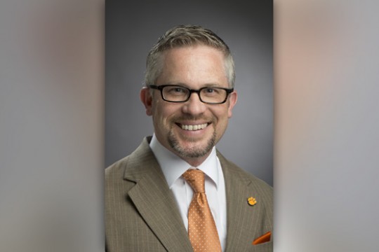 Professor posing for camera