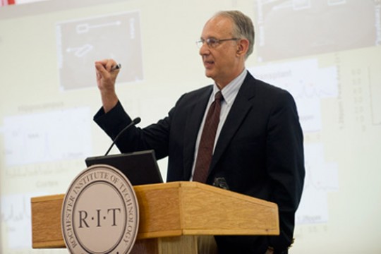 Person giving speech at podium