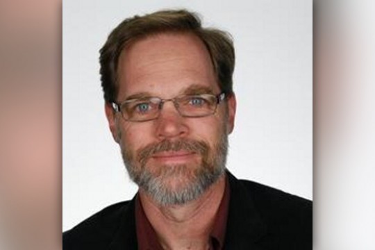 Professor posing for camera