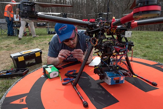 Person working on Drone