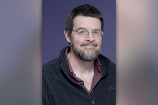 Professor posing for camera