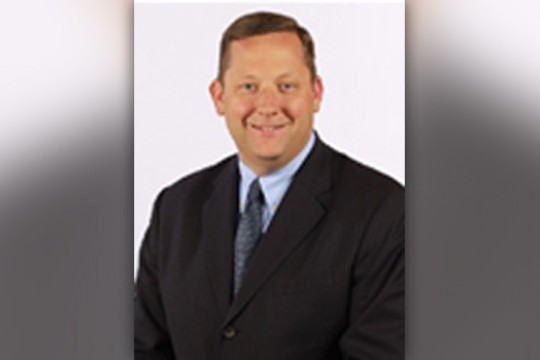 Professor posing for camera