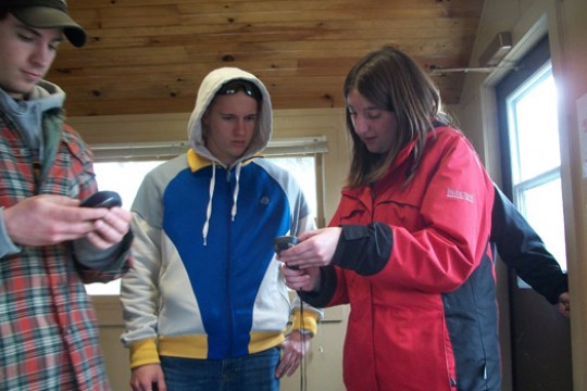 People looking at device