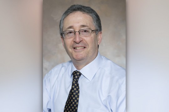 Professor posing for camera