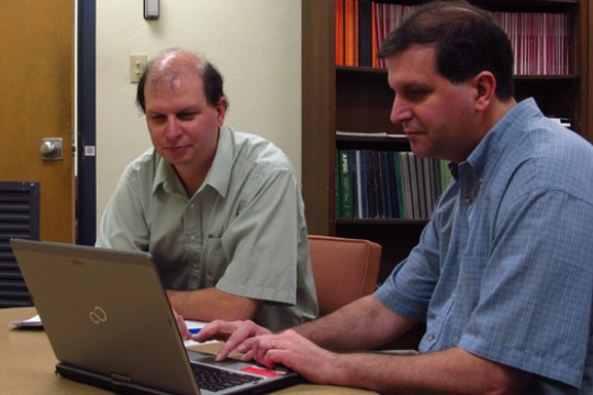 Two people working in classroom