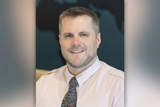 Professor posing for camera