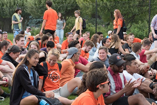 New students gathered on field together