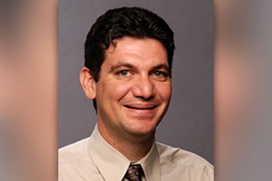 Professor posing for camera