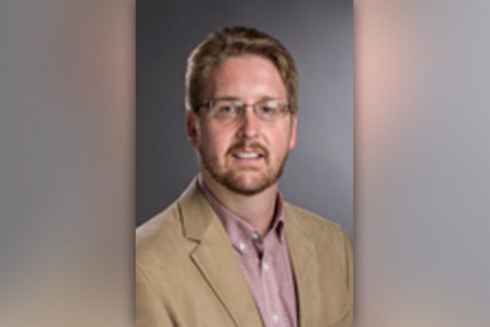 Professor posing for camera