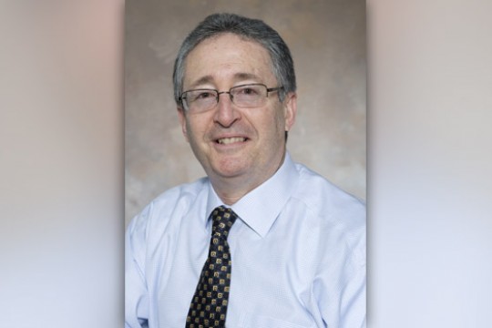 Professor posing for camera