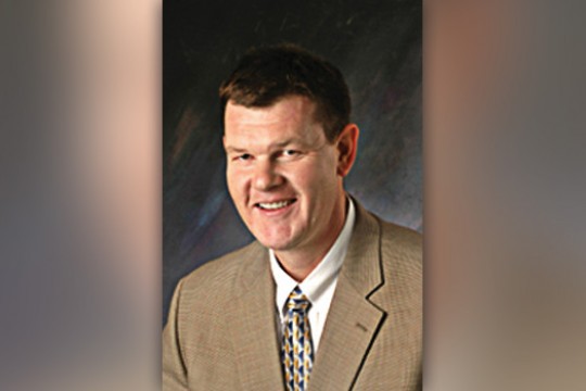 Professor posing for camera