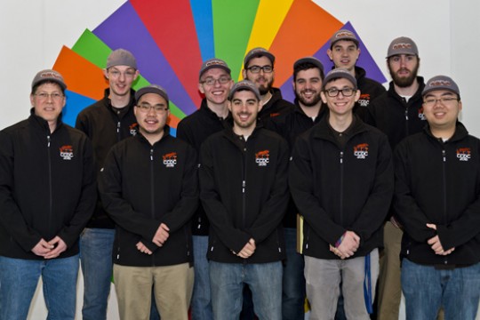 People posing in uniform