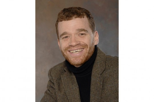 Professor posing for camera