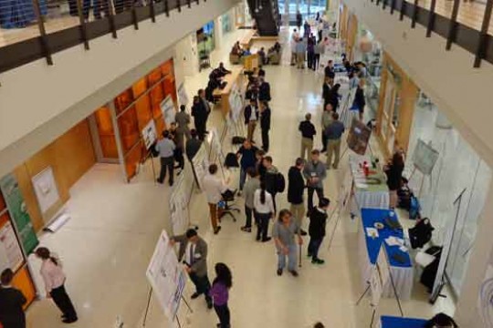 People walking around indoor event