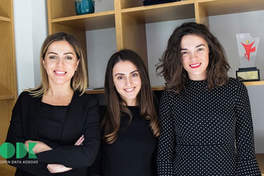 Dafina Olluri, Blerta Thachi, Blinera Meta wearing dark dress clothes pose for photo.