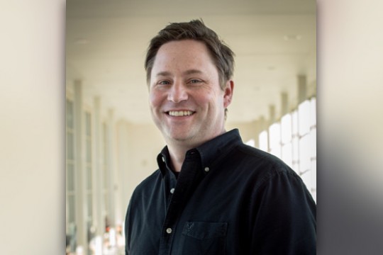 Person posing for camera in hallway