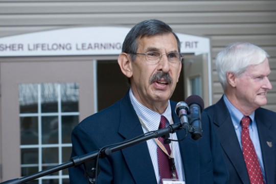Person giving speech at podium