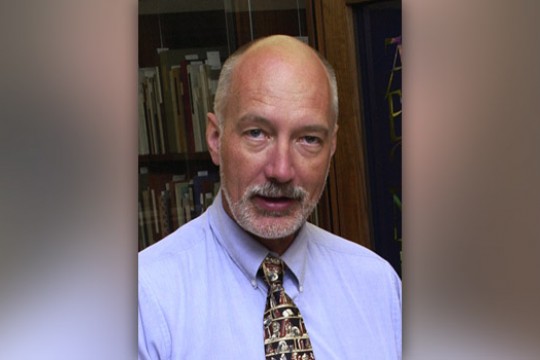 Professor posing for camera