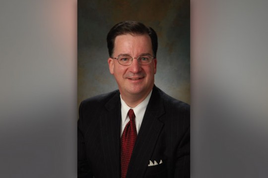 Professor posing for camera