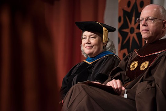 President Munson and Provost Granberg wearing commencement regalia.