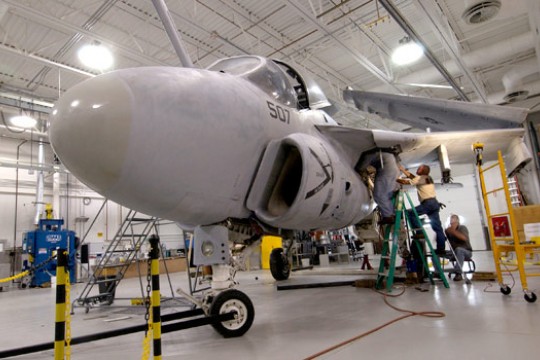 Air Plane being worked on in hanger