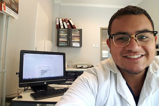 A selfie of Luis Reyes-Umana in an office at a hospital in Chile.