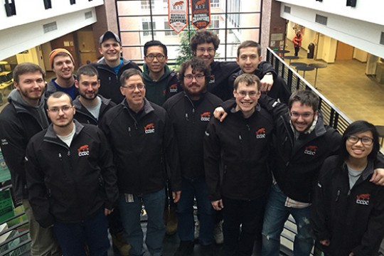 People gathered for picture on staircase