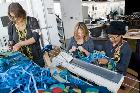 People working on art