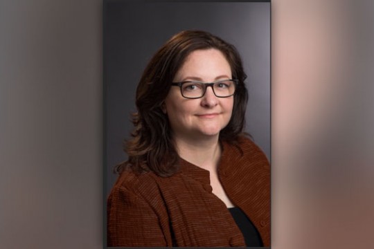 Headshot of Robin Cass.