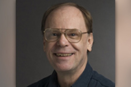 Professor posing for camera