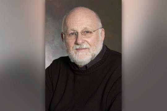 A headshot of R. Roger Remington.