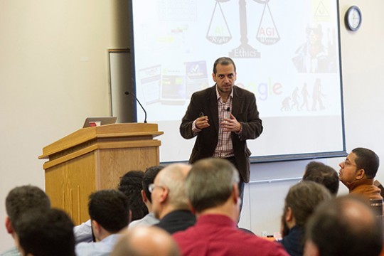 Person speaking to crowd at event