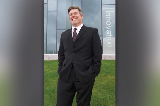 Professor posing for camera