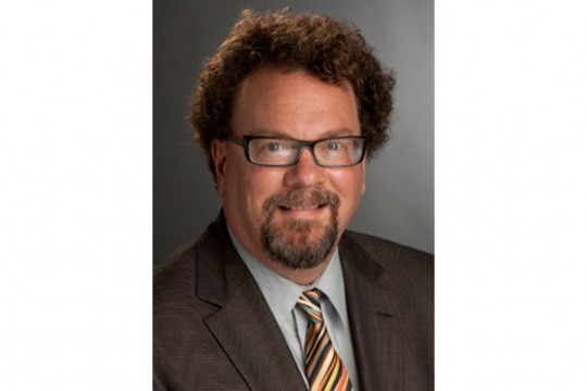 Professor posing for camera