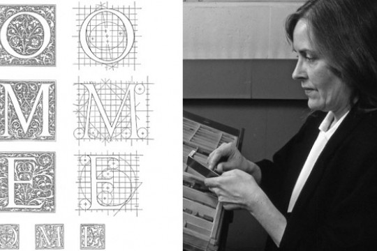 Person making ornate lettering